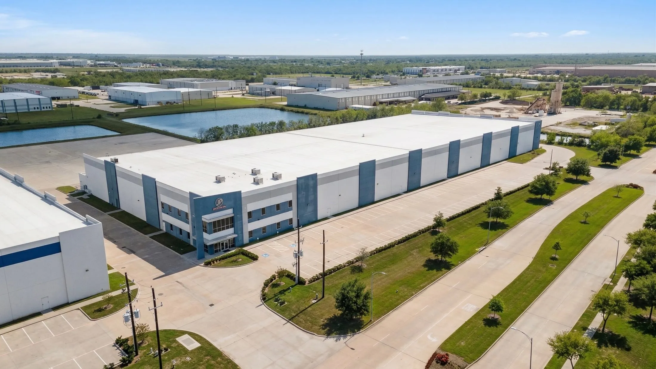 Aerial of the Built Realty Katy industrial property with retention ponds and landscaping